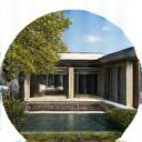 Extension vitrée contemporaine sur une maison ancienne